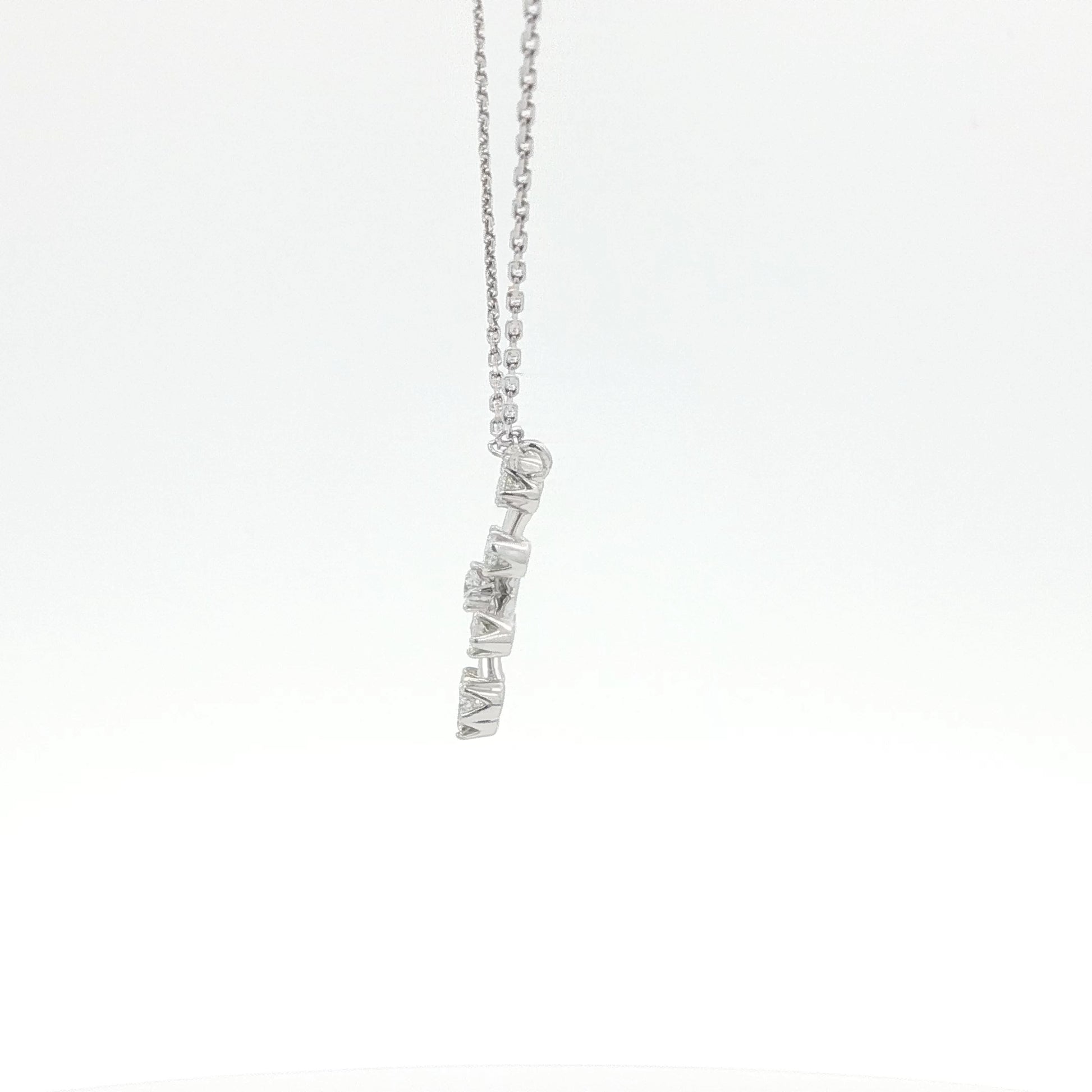Silver necklace with a unique pendant on a white background