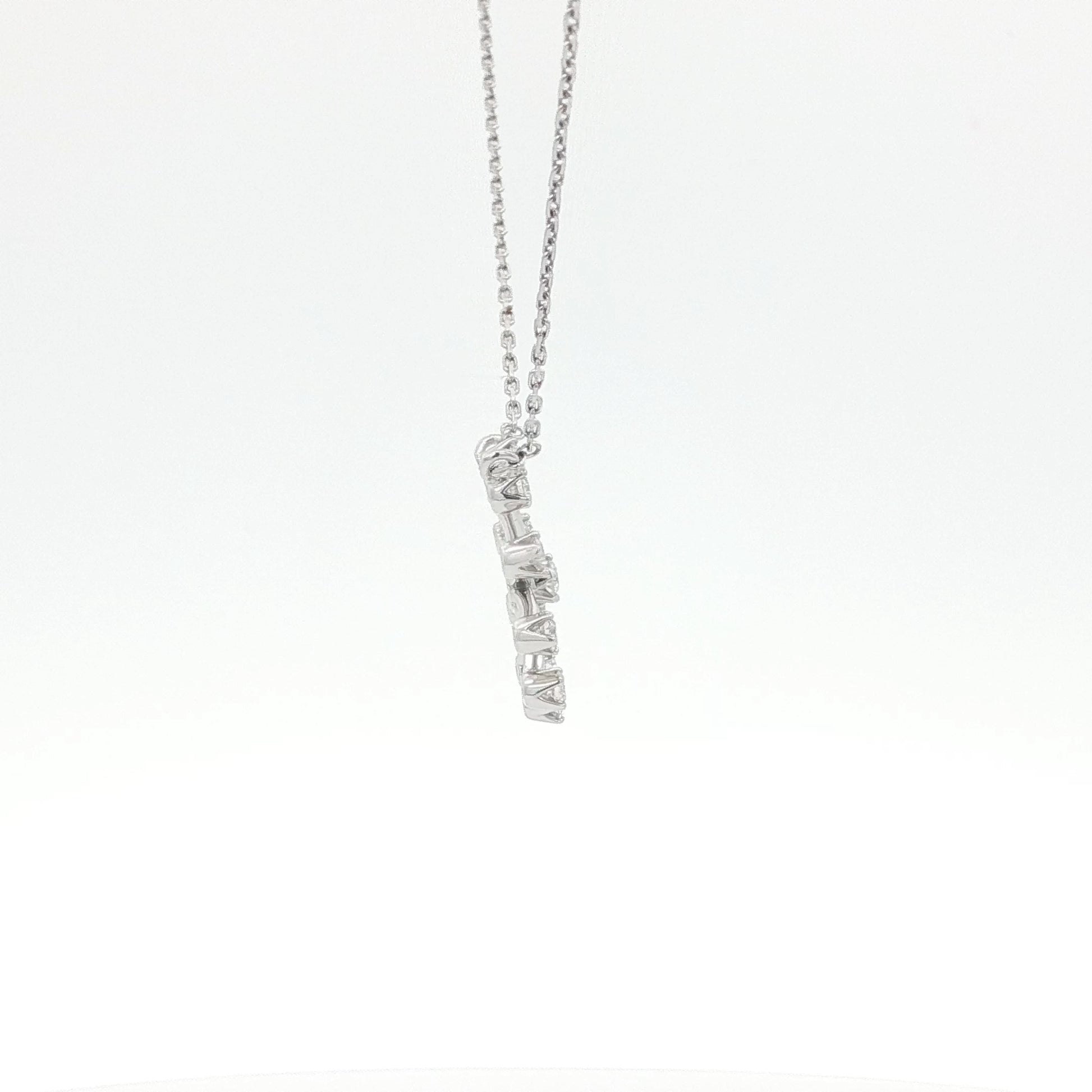 Silver necklace with a pendant on a white background
